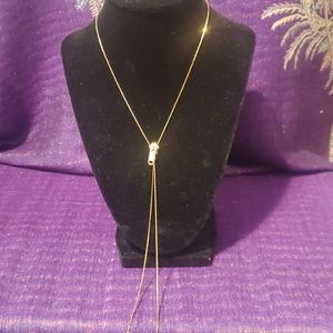 Gold tone necklace